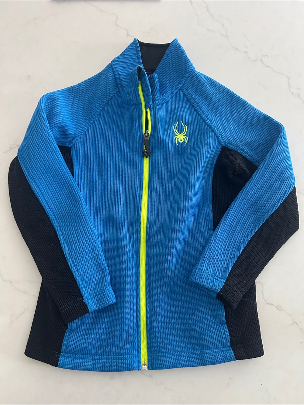 Spyder Blue and Black Kids Full-Zip Fleece Jacket with Neon Yellow Zipper